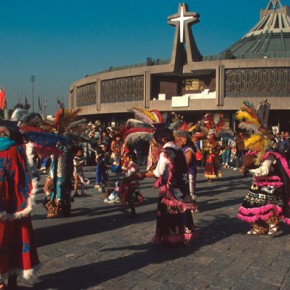 Prehispanic dancers in front of the Basilica in Mexico City for the day of the Virgin of Guadalupe